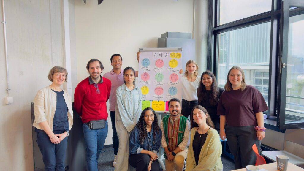 Rishika (second from right in second row) with her team